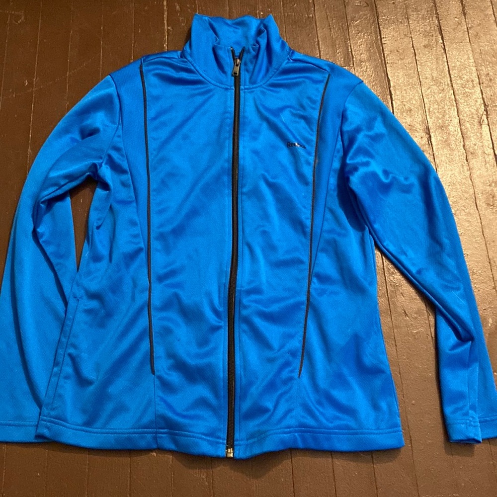 Blue Reebok athletic jacket
